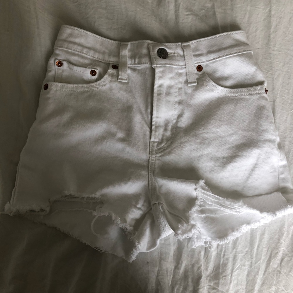 Selling these Levi white shorts
